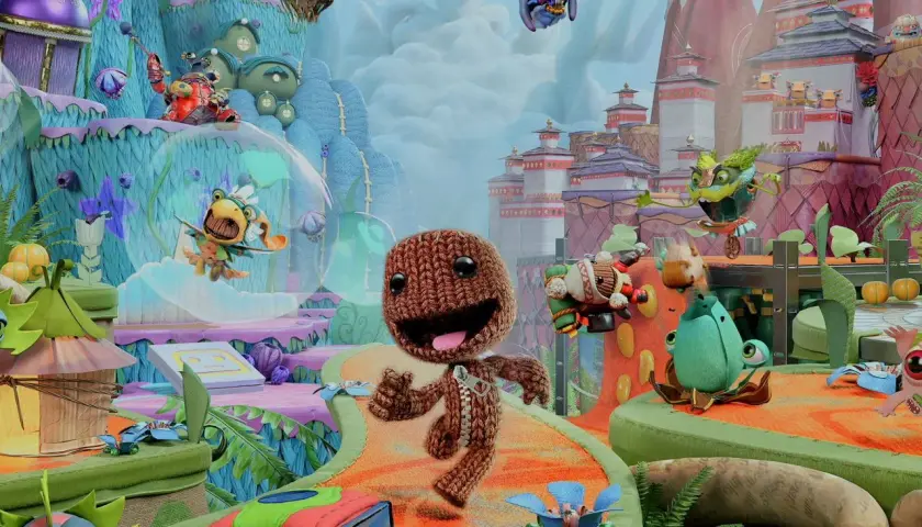 Kolorowy świat gry, gdzie Sackboy i jego przyjaciele przygotowują się do wspólnej zabawy. Idealne gry na 3 osoby!